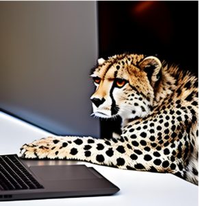 キーボードをそっと触るチーター